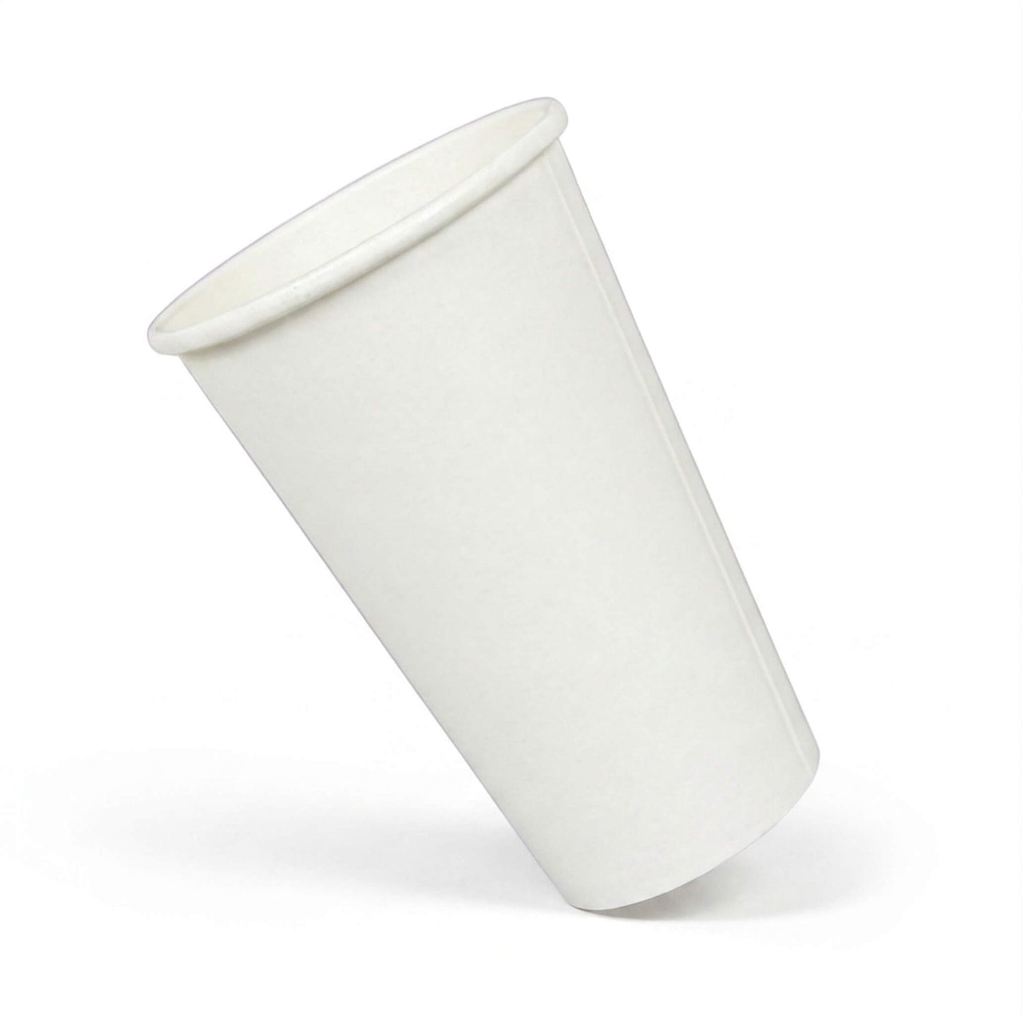 A single Axxion 16-ounce plain white disposable paper cup tilted on a white background. This unprinted hot and cold beverage cup is packaged in sleeves of 50 and distributed for wholesale at 1000 cups per case.